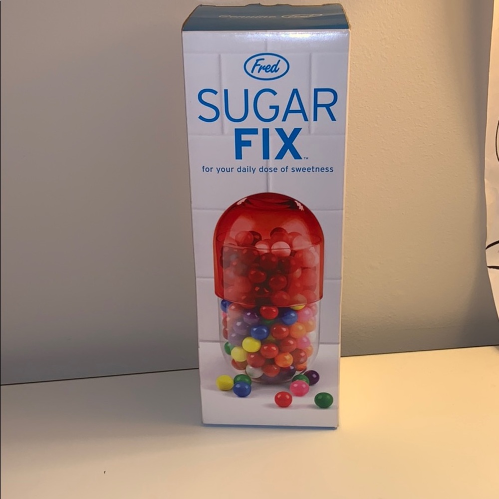 Pill shaped candy holder